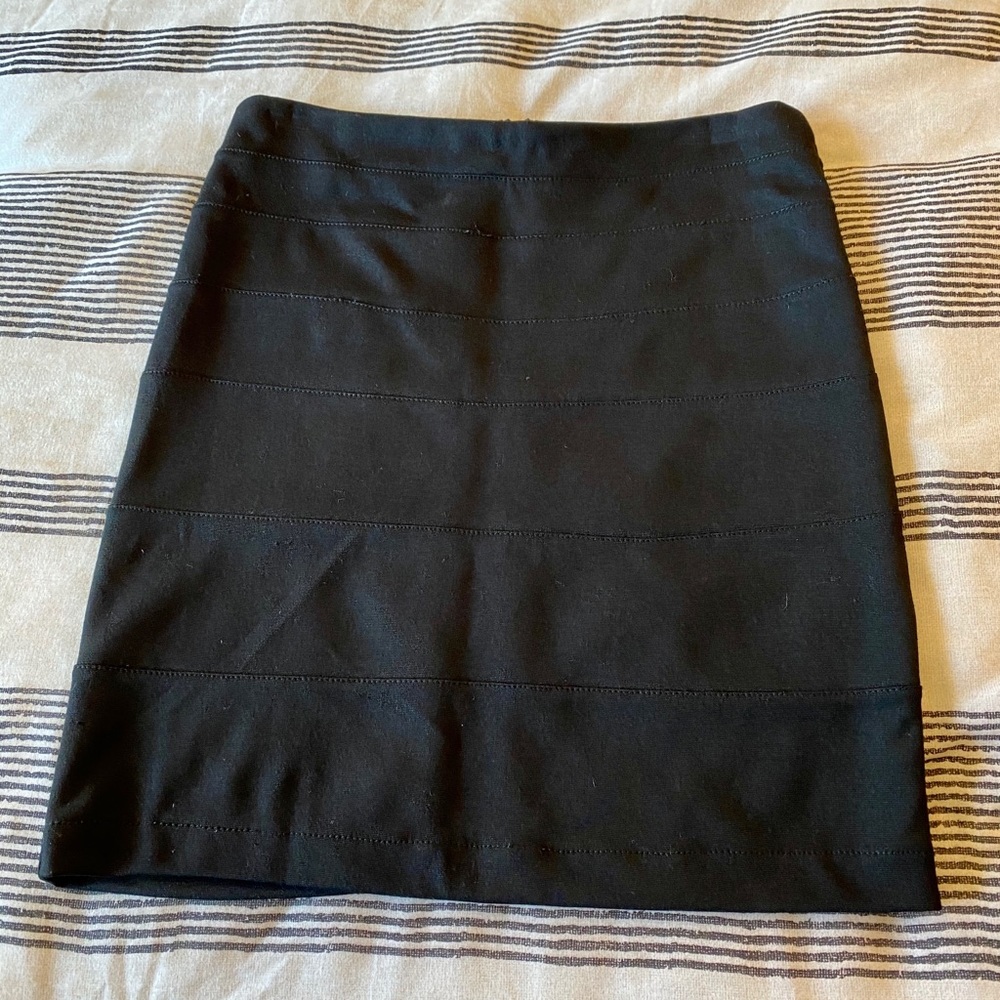 Black zip back mini skirt